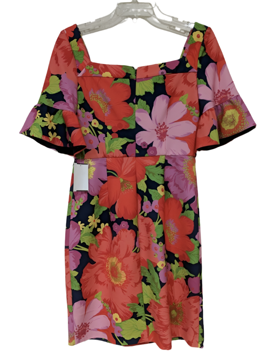 The vibrant multi-colored floral pattern square neck, zippered back, short ruffle sleeves adds a pop of color to your wardrobe.