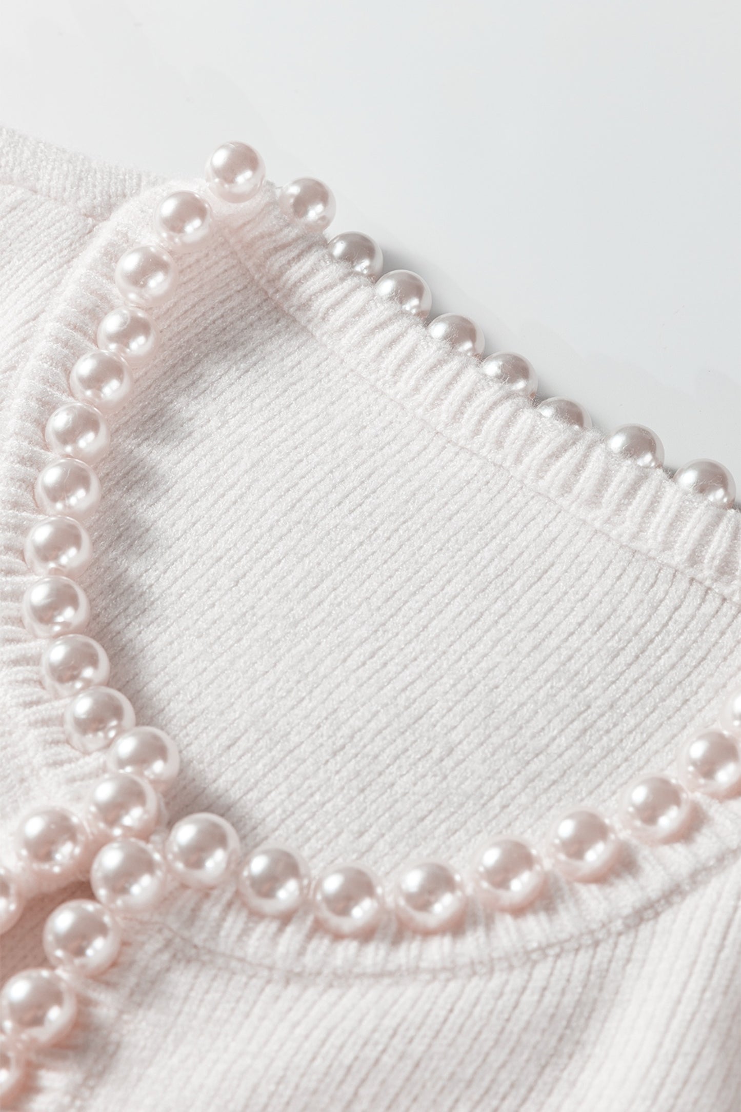 Pearl Elegance Cardigan — Luxe Cream Ribbed Knit Sweater with Pearl-Trim Open Front