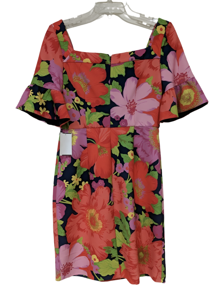 The vibrant multi-colored floral pattern square neck, zippered back, short ruffle sleeves adds a pop of color to your wardrobe. 