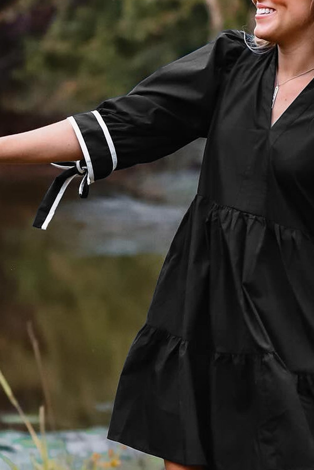 Classic Black Tiered Mini Dress with Tie Sleeve Detail – Effortless Chic Style