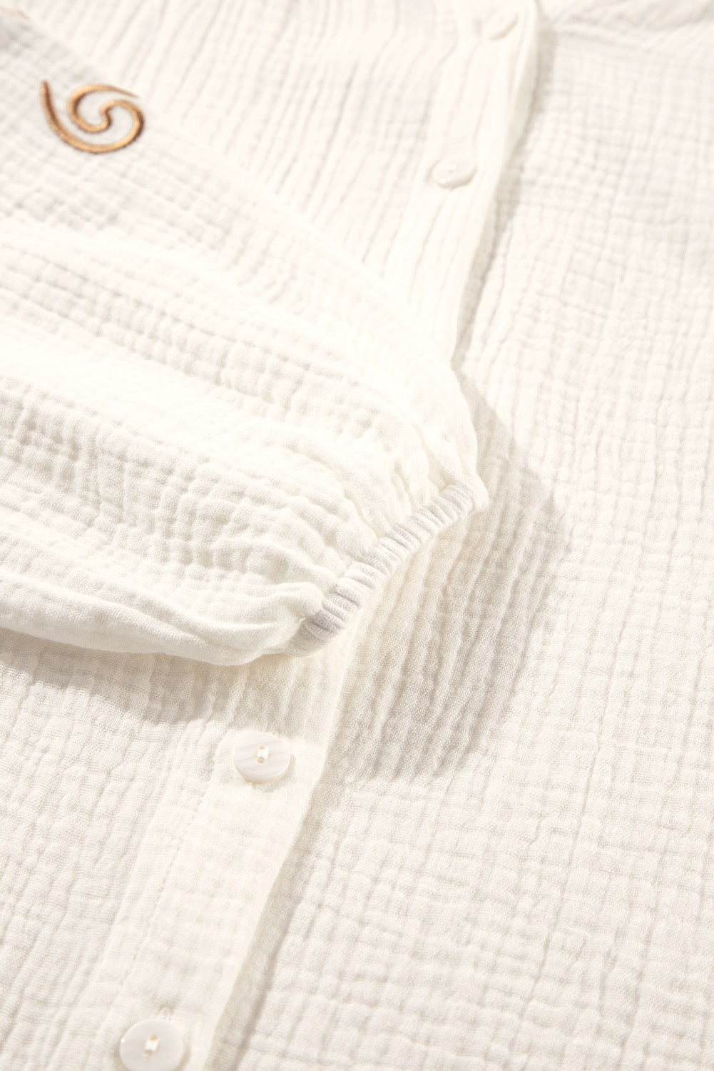 swatch of white blouse sleeve