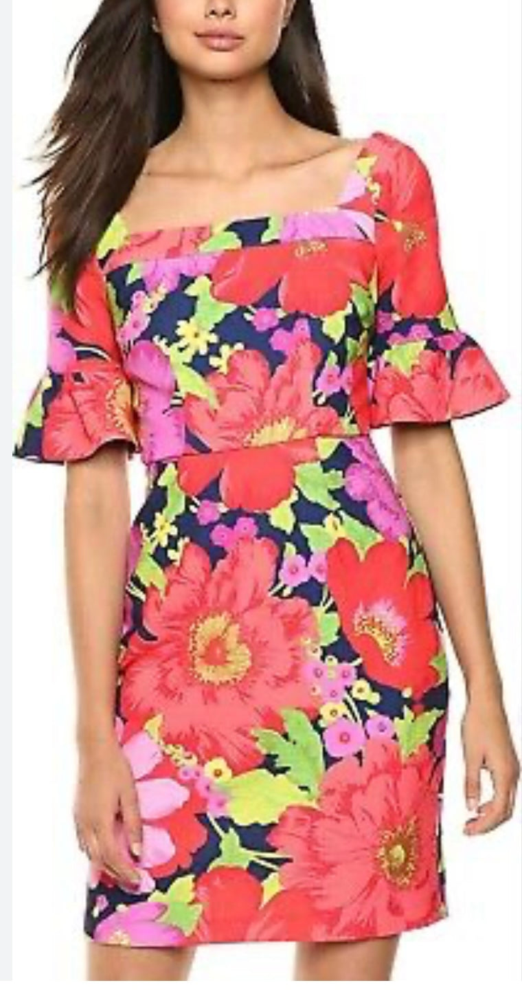 The vibrant multi-colored floral pattern square neck short ruffle sleeves adds a pop of color to your wardrobe. 