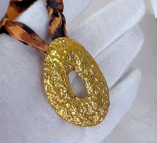 Luxe Safari Silk-Rope Necklace with Textured Gold Oval Pendant