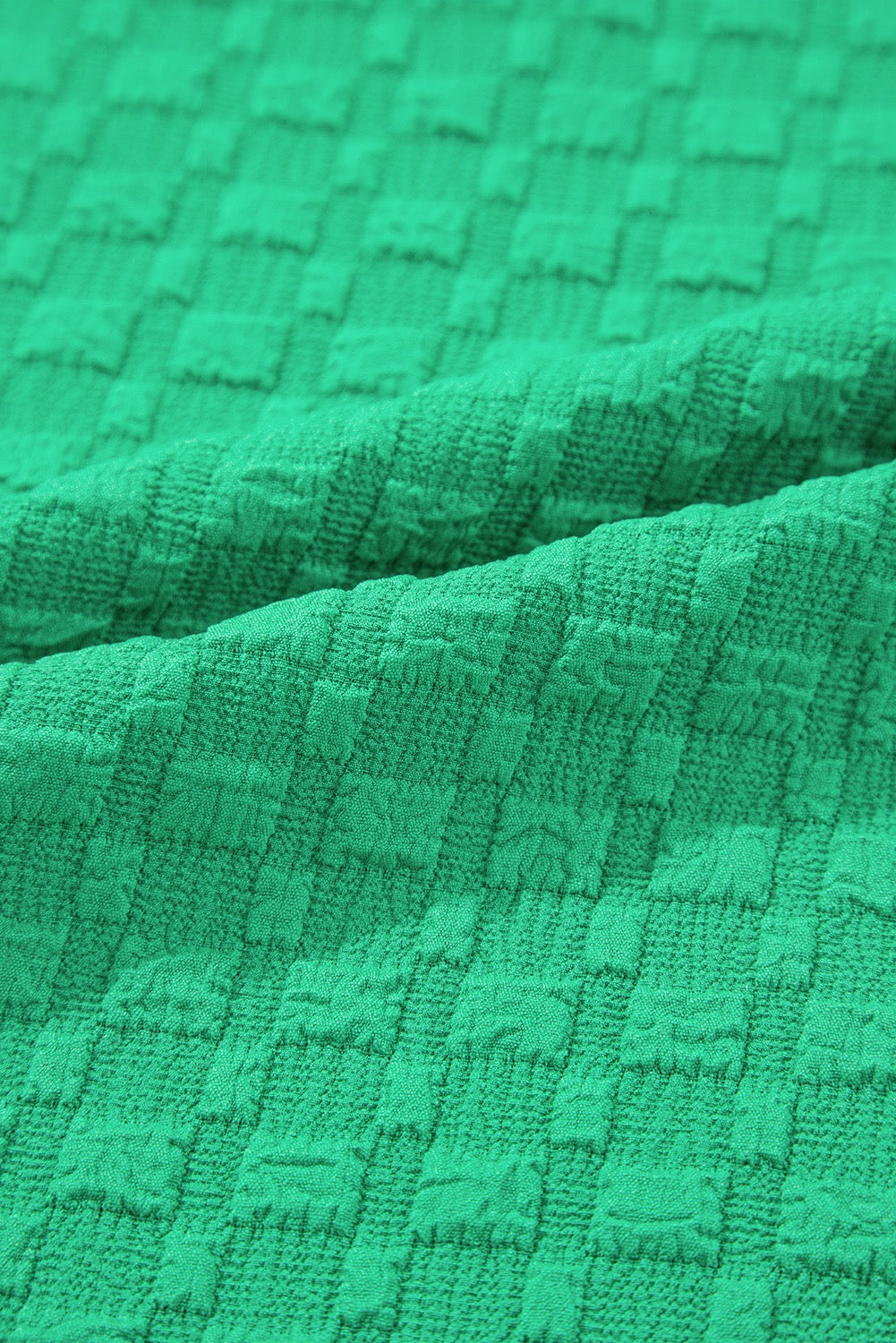 Close-up of green textured fabric