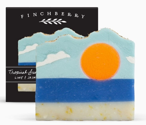 Bar of soap with sunset design and Finchberry packaging in the background
