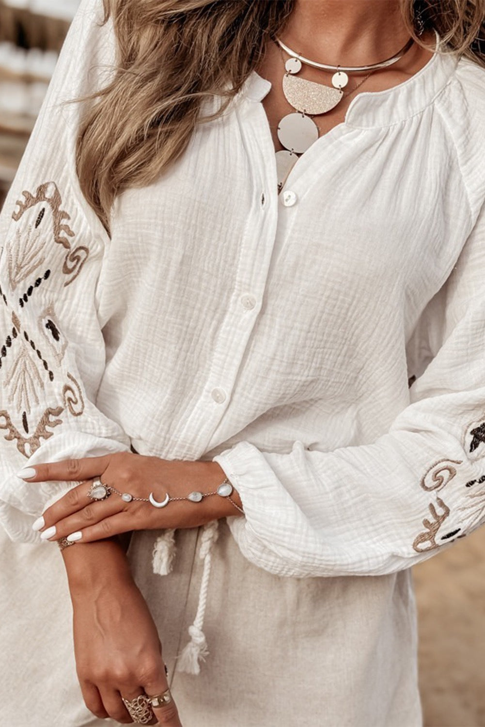 Woman wearing Embroidered Textured Button Front Crew Neck Blouse - White 