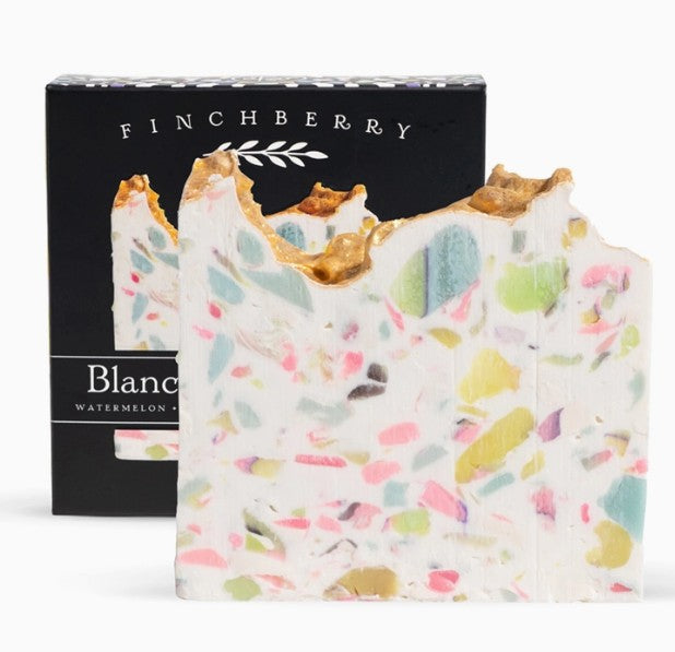 Colorful terrazzo-patterned soap bar with 'Finchberry' branding in the background