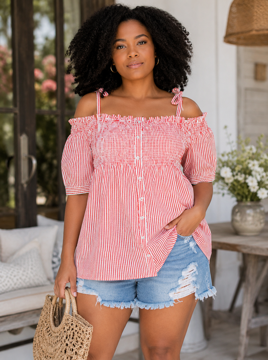 Woman wearing a red and white striped off shoulder peasant top  with ties and denim shorts